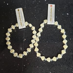 NWT. Vintage Batman & Superman Elegant Cream and Silver Beaded Bracelet Set